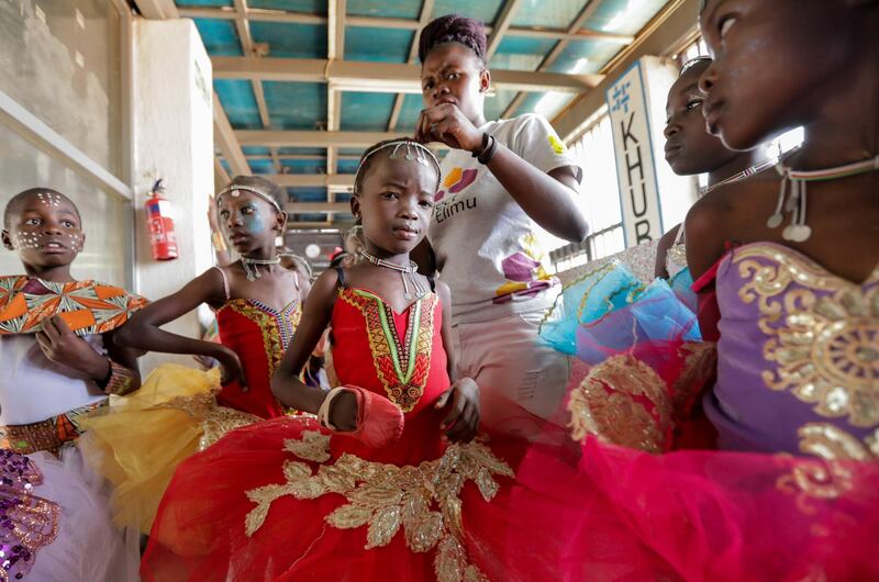 Young ballerinas wait backstage before a performance to showcase their skills in Kibera, Nairobi, Kenya. EPA