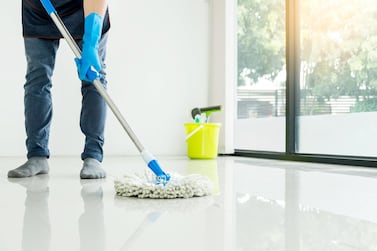 We should be aiming to mop floors at least once a week. Getty Images
