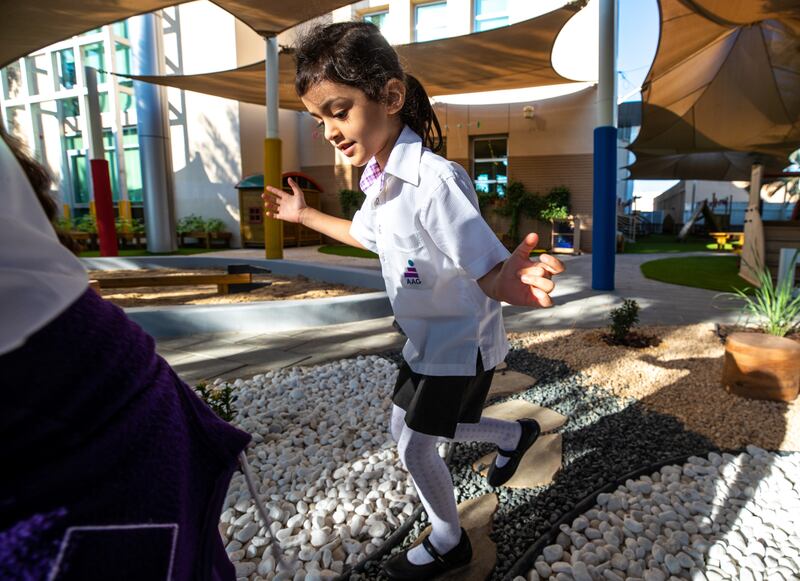 Practising balancing skills during break at American Academy for Girls.