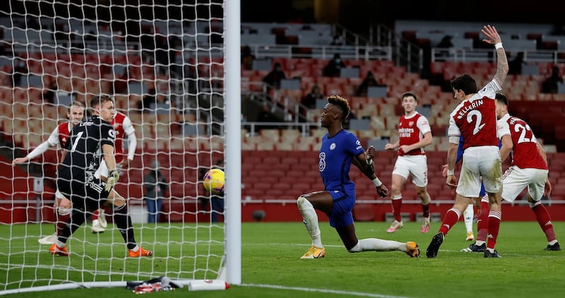 Tammy Abraham chests the ball home to pull one back for Chelsea. PA