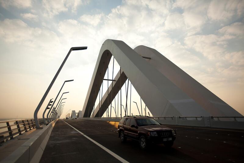 November 28, 2010 - Abu Dhabi, UAE -   Motorists drive across Sheikh Zayed Bridge on Sunday November 28, 2010.  The Sheikh Zayed Bridge in Abu Dhabi is now officially open.  The 842-metre construction, opened by Sheikh Khalifa last night, is the fourth bridge to link Abu Dhabi to the mainland.    (Andrew Henderson/The National)