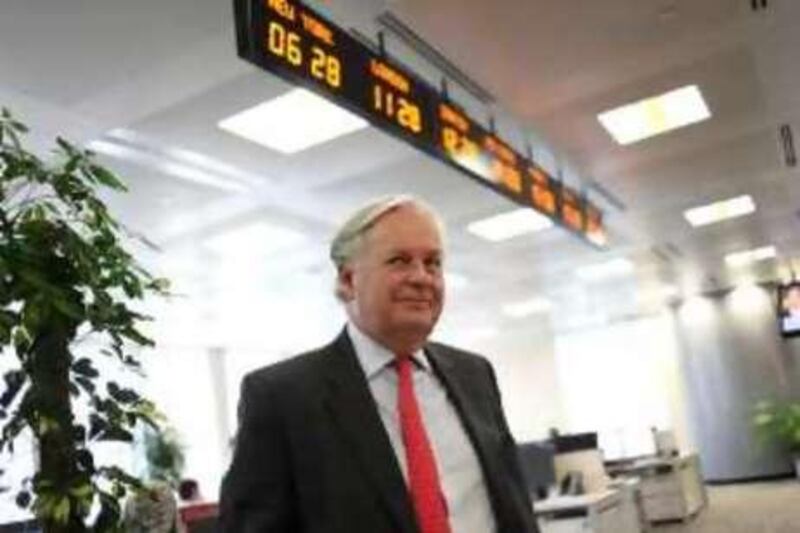 August 10, 2010 / Abu Dhabi / (Rich-Joseph Facun / The National) Michael H. Tomalin (CQ) Chief Executive of the National Bank of Abu Dhabi, poses for his portrait on the trading room floor of the NBAD's main office, Tuesday, August 10, 2010 in Abu Dhabi. 