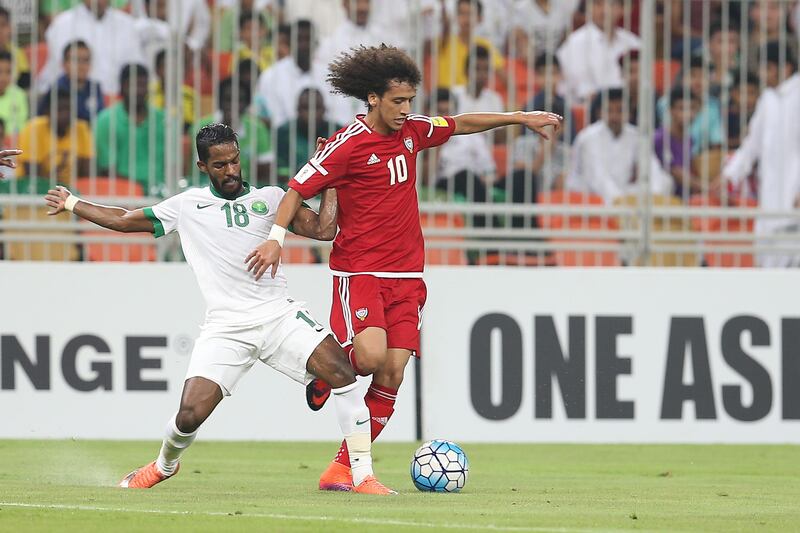 Omar Abdulrahman of the UAE holds off Nawaf Al Abid of Saudi Arabia leap for the ball during the World Cup 2018 qualifier between Saudi Arabia and UAE in King Abdullah Sports City, Jeddah, Saudi Arabia. 11 October 2016. Photo: Aletihad *** Local Caption ***  sp12oc-pg3-SaudiUAE2.jpg