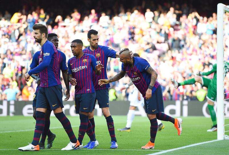 Arturo Vidal celebrates his opening goal against Getafe with his Barcelona teammates. Getty Images