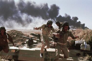 An Iraqi tank crew during an Iranian air strike in Abadan, Iran in October 1980. The eight year Iran-Iraq war, which ended in 1988 continue to define views in both countries of each other AP