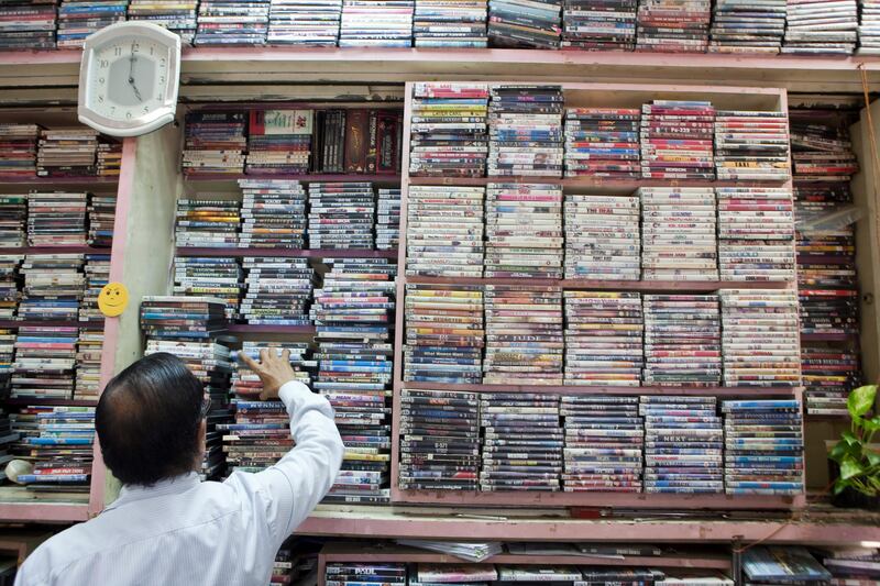 DUBAI, UNITED ARAB EMIRATES,  JULY 03, 2013. Mr Sethuraman Ramathikagam, owner of the Cresent Video store in Kuwait str, Karama who has been running this store for the last 28 years. (ANTONIE ROBERTSON / The National) Journalist freelancer Malavika