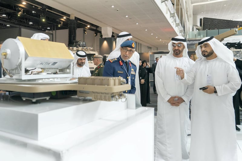 ABU DHABI, UNITED ARAB EMIRATES - February 20, 2019: HH Sheikh Mohamed bin Zayed Al Nahyan, Crown Prince of Abu Dhabi and Deputy Supreme Commander of the UAE Armed Forces (2nd R) visits Boeing stand, during the 2019 International Defence Exhibition and Conference (IDEX), at Abu Dhabi National Exhibition Centre (ADNEC). Seen with HE Major General Essa Saif Al Mazrouei, Deputy Chief of Staff of the UAE Armed Forces (3rd R).

( Rashed Al Mansoori / Ministry of Presidential Affairs )
---