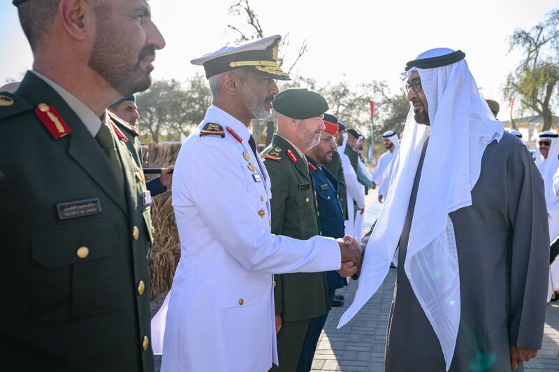 President Sheikh Mohamed greets Rear Admiral Sheikh Saeed bin Hamdan bin Mohamed Al Nahyan, Commander of the UAE Naval Forces
