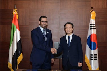 Dr Sultan Al Jaber, UAE Minister of State and Adnoc Group CEO signs an agreement in Korea with Kim Young-Doo, Kogas chief executive. Courtesy Adnoc