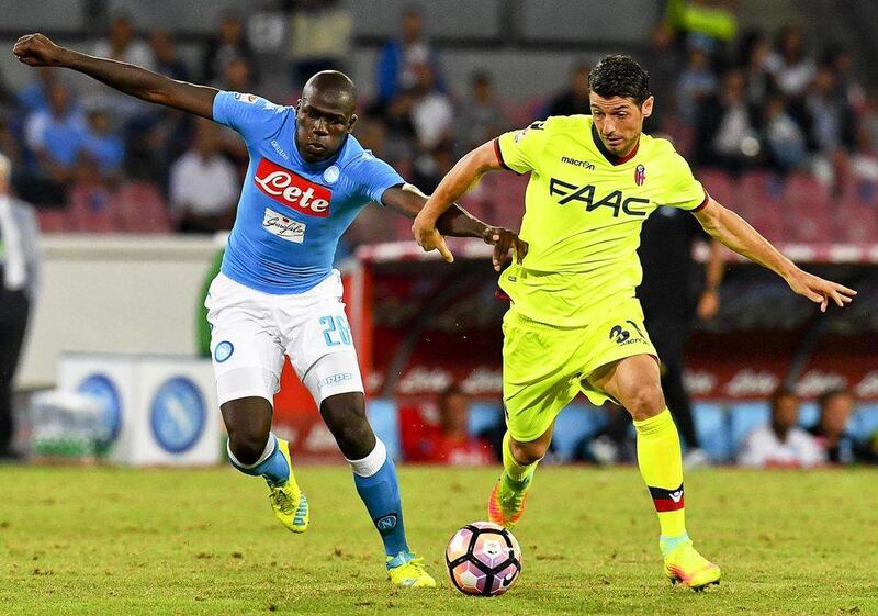 Kalidou Koulibaly, left,  has also been linked with Juventus after helping Napoli challenge the Turin club for the Scudetto. Ciro Fusco / EPA