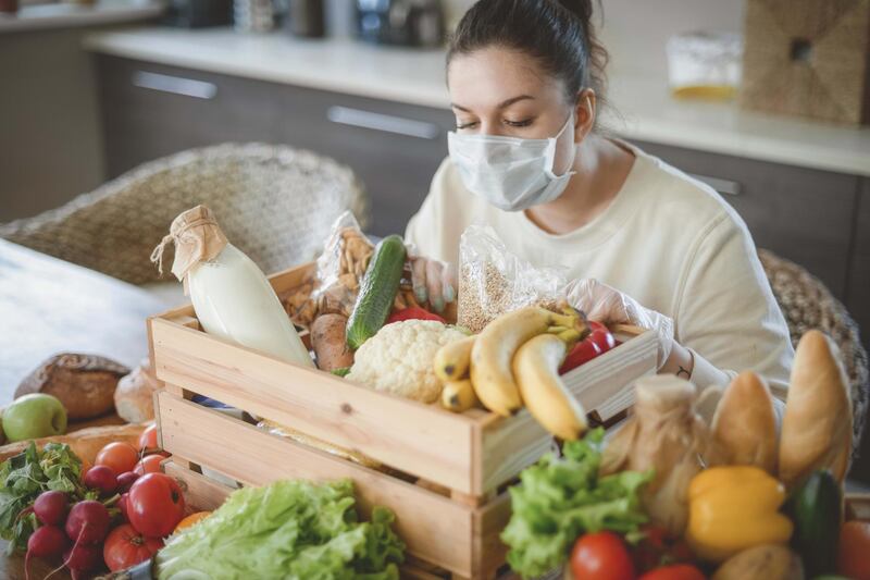 delivery food in box to the home during quarantine and pandemic. Getty Images