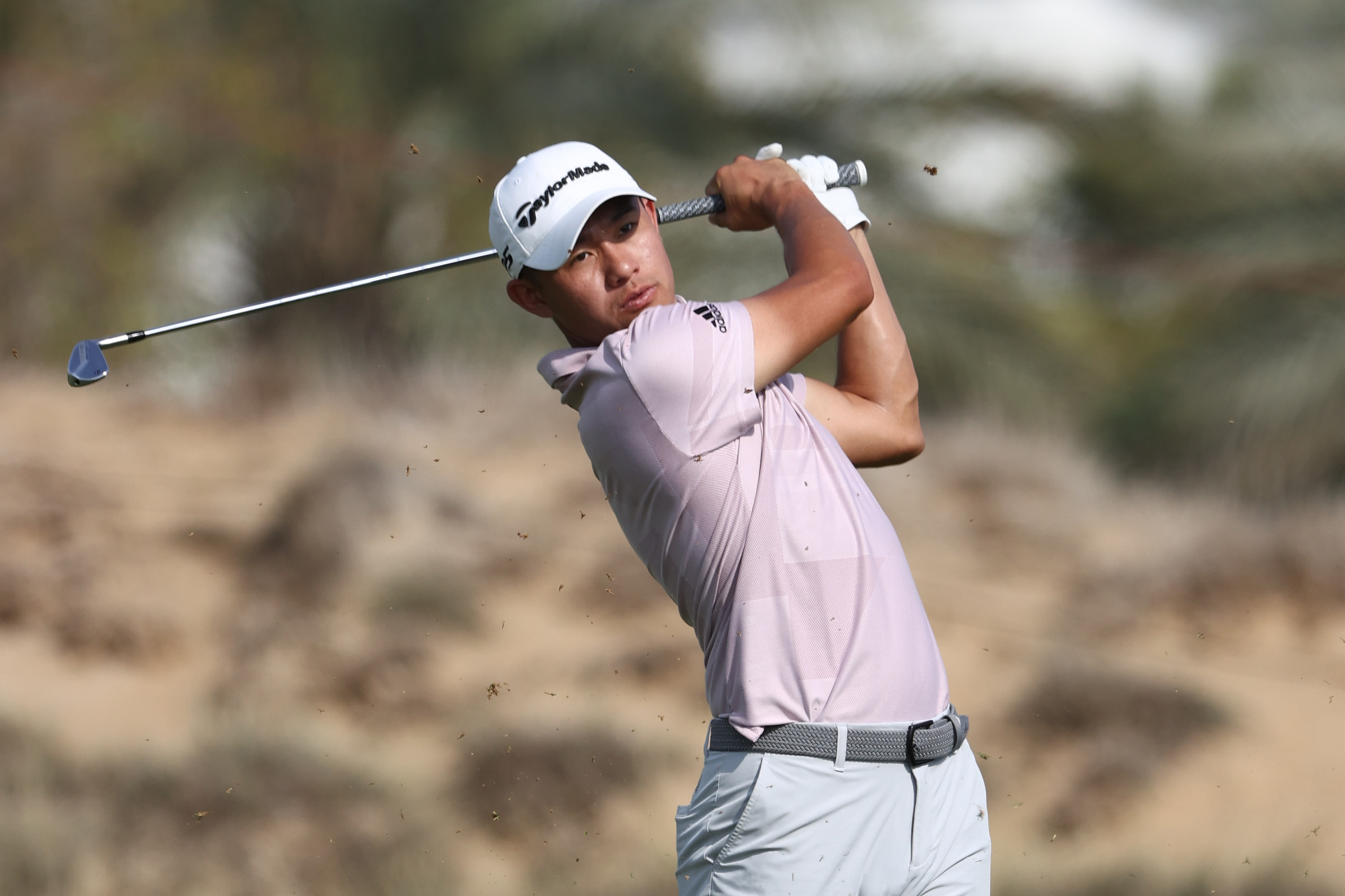 ABU DHABI, UNITED ARAB EMIRATES - JANUARY 18:  Collin Morikawa of the USA hits an approach shot during a practice round prior to the Abu Dhabi HSBC Championship at Yas Links Golf Course on January 18, 2022 in Abu Dhabi, United Arab Emirates. (Photo by Francois Nel / Getty Images)