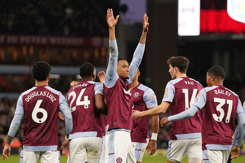 Aston Villa's Ezri Konsa, front, and his teammates celebrate his winner against Wolves in the Premier League game at Villa Park on Saturday, March 30, 2024. PA