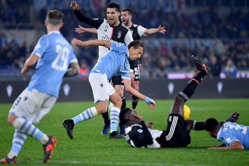 Lazio and Juventus players in action. AFP