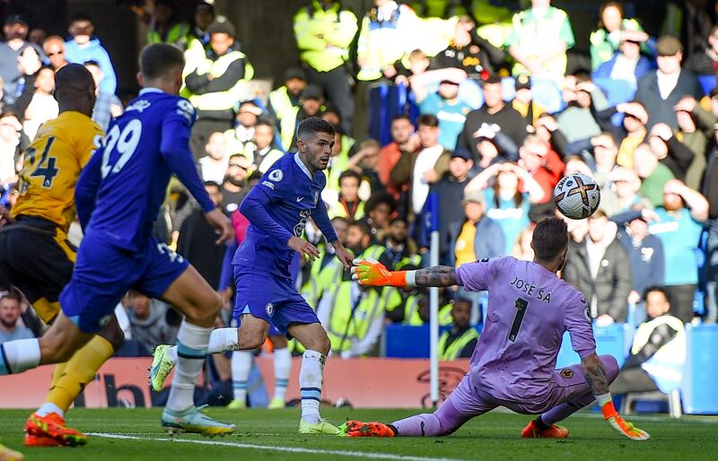 Christian Pulisic  scores the second past goalkeeper Jose Sa. EPA