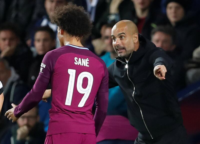 Soccer Football - Carabao Cup Third Round - West Bromwich Albion vs Manchester City - The Hawthorns, West Bromwich, Britain - September 20, 2017   Manchester City manager Pep Guardiola speaks with Leroy Sane   Action Images via Reuters/Matthew Childs    EDITORIAL USE ONLY. No use with unauthorized audio, video, data, fixture lists, club/league logos or "live" services. Online in-match use limited to 75 images, no video emulation. No use in betting, games or single club/league/player publications. Please contact your account representative for further details.