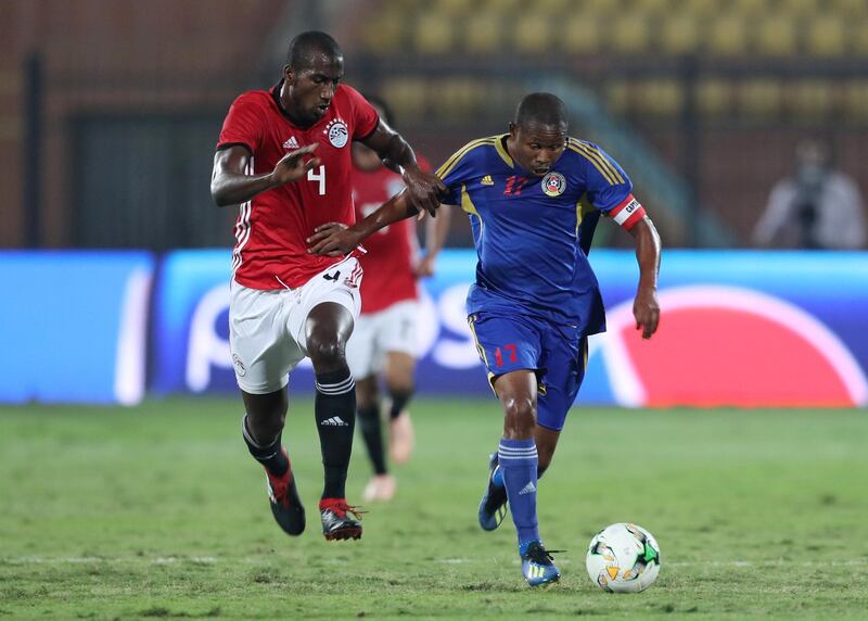 Egypt's Aly Mohamed in action with eSwatini's Tony Tsabedze. Reuters