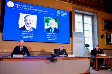 The Nobel Prize for Economics committee announces US economists Paul Milgrom and Robert Wilson as the joint winners of this year's award. AFP