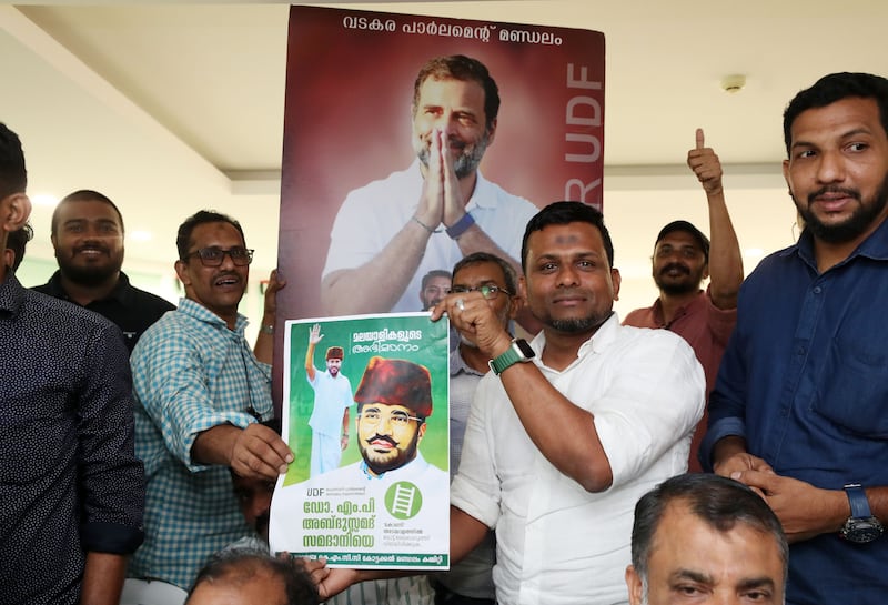 Supporters of the opposition party at the KMCC Kerala Muslim Cultural Centre, Dubai. Chris Whiteoak / The National