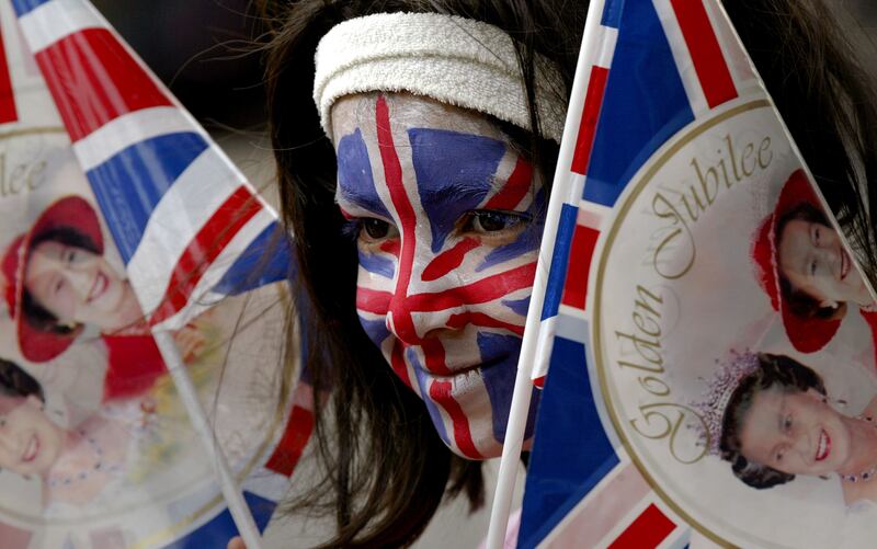 Lina Sultana, 8, has her face painted at a golden jubilee street party in June 2002 in Stepney, east London. 