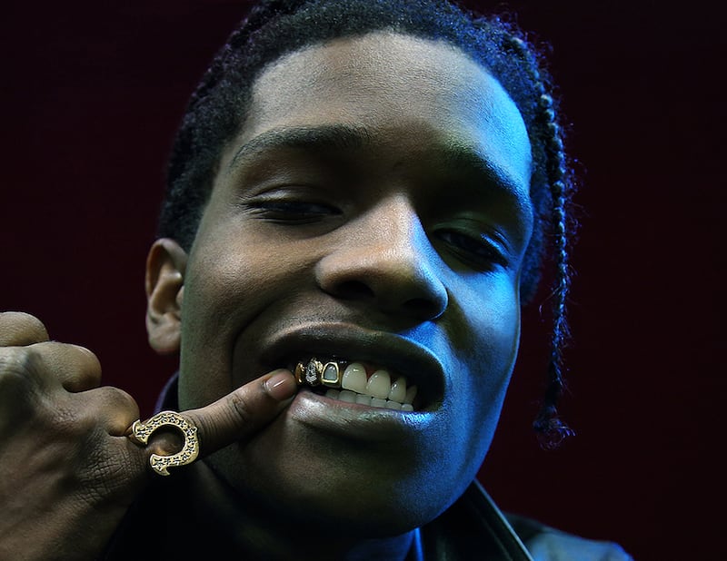 A$AP Rocky shows off his grills. Photo: Mike Miller