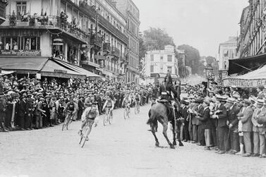 21st July 1925: Ottavio Bottecchia of Italy chases Lucien Buysse of Belgium through St Cloud during the final stage of the 1925 Tour de France. Bottecchia went on to win and Buysse came second. (Photo by Topical Press Agency/Getty Images)