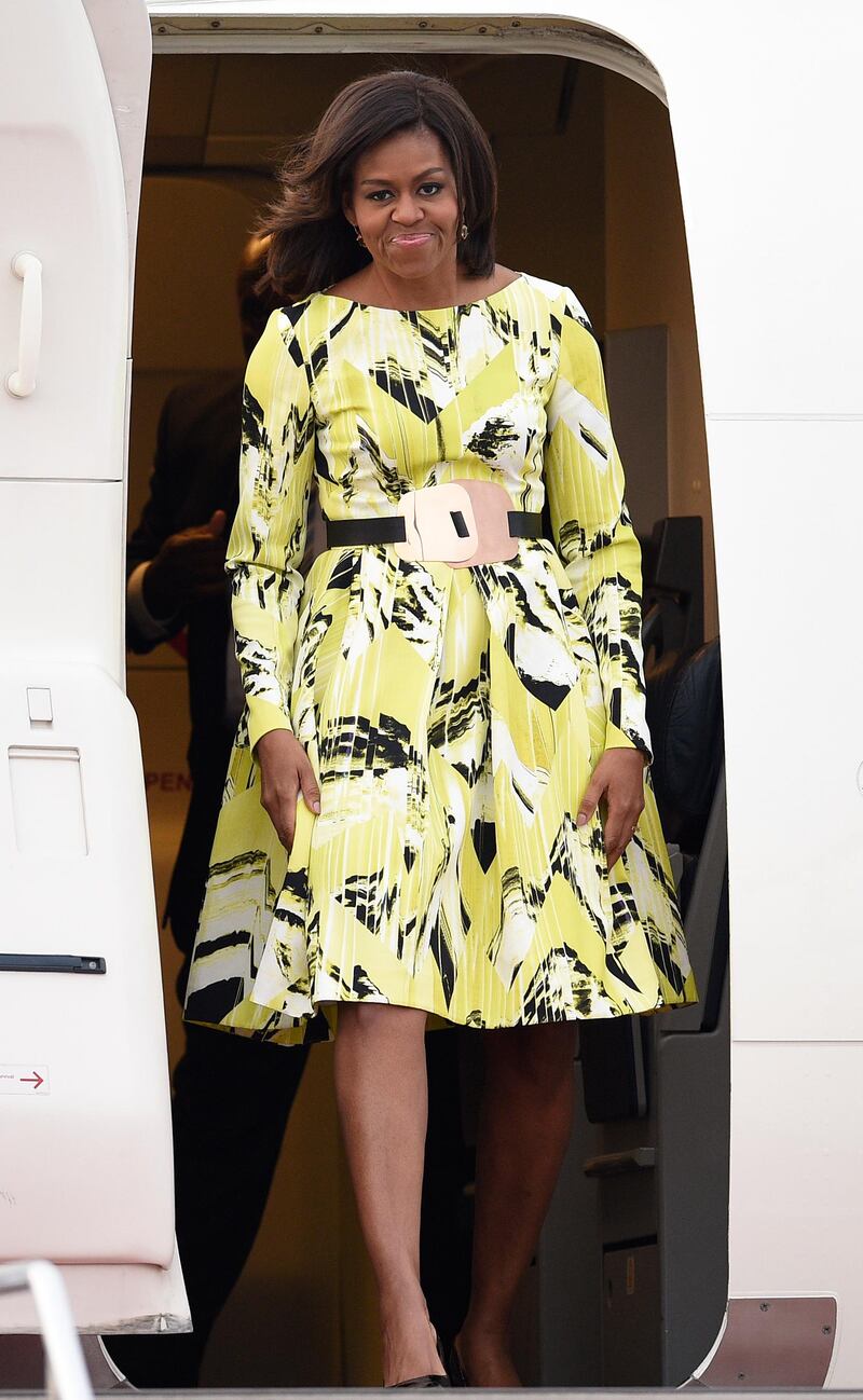epa04667131 US First Lady Michelle Obama upon her arrival at Haneda international airport in Tokyo, Japan, 18 March 2015. Michelle Obama arrived in Japan for a three-day visit where she will take part in a Japan-US Joint Girls Education event and visit cultural sites in Kyoto.  EPA/FRANCK ROBICHON
