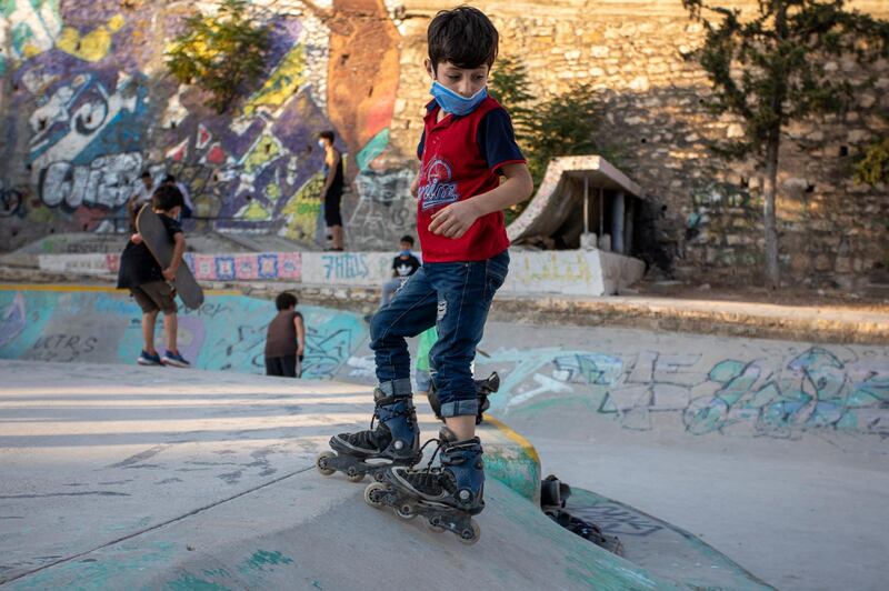 A boy roller skates at Seven Hills Skate Park in Downtown Amman, Jordan, on September 22, 2020. The Seven Hills is a Jordanian non-profit organisation that uses skateboarding as a tool to encourage social cohesion, youth leadership and gender equality. Andre Pain / EPA