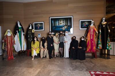 The finalists and organizers with the five shortlisted designs at Hotel Indigo. Photo: Ruel Pableo for The National 
