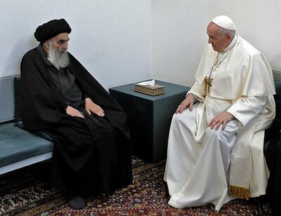 TOPSHOT - A handout picture provided by the Vatican media office shows Pope Francis meeting top Shiite cleric Grand Ayatollah Ali al-Sistani, in the Iraqi shine city of Najaf, on March 6, 2021. === RESTRICTED TO EDITORIAL USE - MANDATORY CREDIT "AFP PHOTO / HO / Vatican News" - NO MARKETING - NO ADVERTISING CAMPAIGNS - DISTRIBUTED AS A SERVICE TO CLIENTS ===
 / AFP / VATICAN MEDIA / STRINGER / === RESTRICTED TO EDITORIAL USE - MANDATORY CREDIT "AFP PHOTO / HO / Vatican News" - NO MARKETING - NO ADVERTISING CAMPAIGNS - DISTRIBUTED AS A SERVICE TO CLIENTS ===
