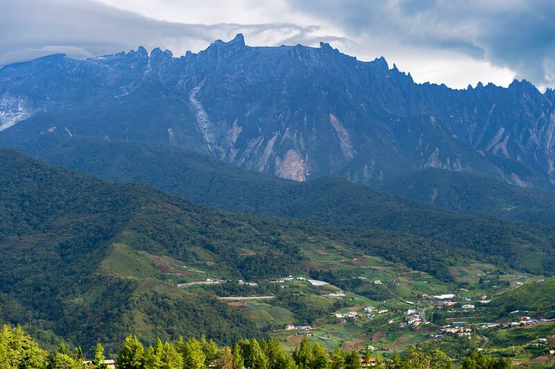 Mount Kinabalu in Malaysia, the highest mountain on the island of Borneo, is located in Kinabalu National Park, a Unesco World Nature Heritage Site. Education Images/Universal Images Group via Getty Images