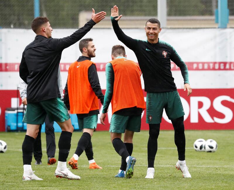Cristiano Ronaldo and Ruben Dias take part in a training session for Portugal. Sergei Karpukhin / Reuters