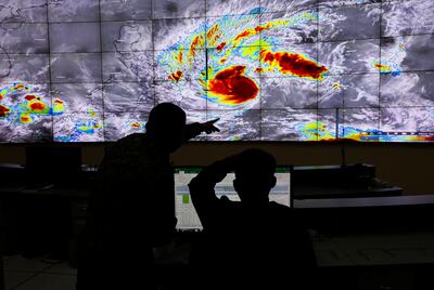 Visual tracking of Typhoon Rai at the Quezon City Emergency Operations Centre in Metro Manila. EPA