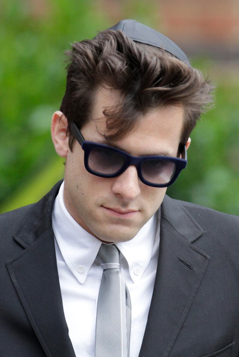 British musician Mark Ronson, leaves Golders Green Crematorium after attending the funeral of Amy Winehouse in north London, Tuesday, July 26, 2011 . The soul diva, who had battled alcohol and drug addiction, was found dead Saturday at her London home. She was 27. Ronson produced her multi-award winning album "Back to Black". (AP Photo/Lefteris Pitarakis) *** Local Caption ***  Britain Amy Winehouse Funeral .JPEG-08ace.jpg