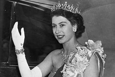 (FILES) In this file photo taken on June 7, 1951 Princess Elizabeth of Great Britain, the future Queen, waves to the people while wearing a diamond crown.  - Queen Elizabeth II, the longest-serving monarch in British history and an icon instantly recognisable to billions of people around the world, has died aged 96, Buckingham Palace said on September 8, 2022.  Her eldest son, Charles, 73, succeeds as king immediately, according to centuries of protocol, beginning a new, less certain chapter for the royal family after the queen's record-breaking 70-year reign.  (Photo by AFP)