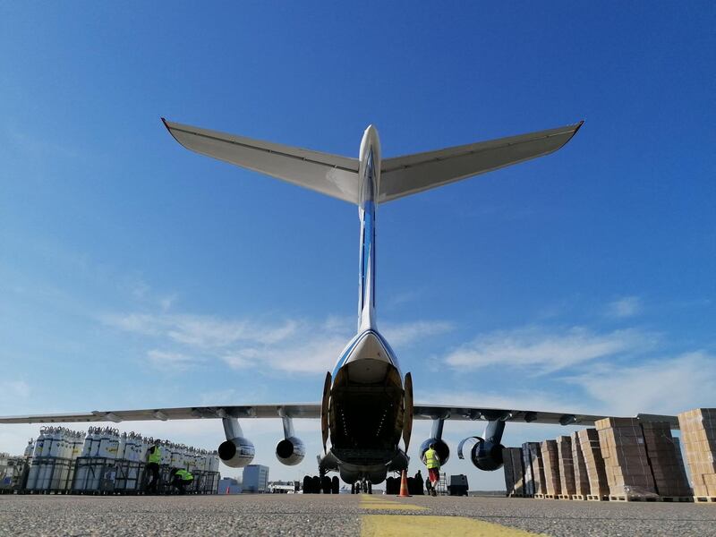 A cargo plane bound for Delhi waits on the tarmac at Helsinki airport in Finland on May 11, 2021 to be loaded with oxygen tanks and ventilators, which Indian hospitals are badly in need of, under an EU aid scheme. AFP