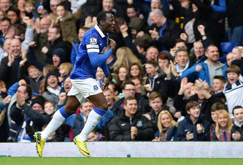 Everton striker Romelu Lukaku celebrates after scoring to give Everton the 2-0 lead over Arsenal on Sunday. Peter Powell / EPA / April 6, 2014