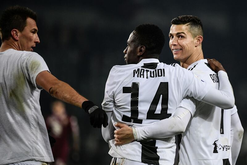 Mario Mandzukic, Blaise Matuidi and Cristiano Ronaldo celebrate at the end of the match. AFP