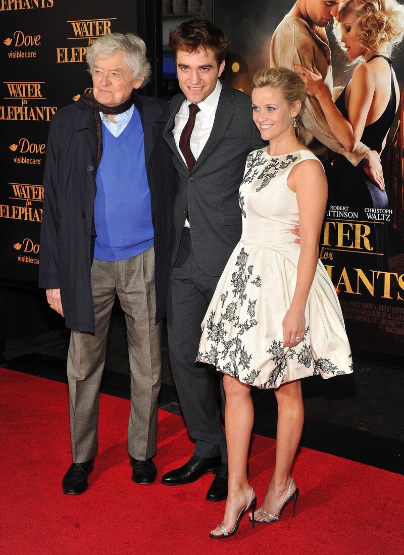 NEW YORK, NY - APRIL 17: (L-R) Actors Hal Holbrook, Robert Pattinson and Reese Witherspoon attend the "Water For Elephants" premiere at the Ziegfeld Theatre on April 17, 2011 in New York City.   Stephen Lovekin/Getty Images/AFP