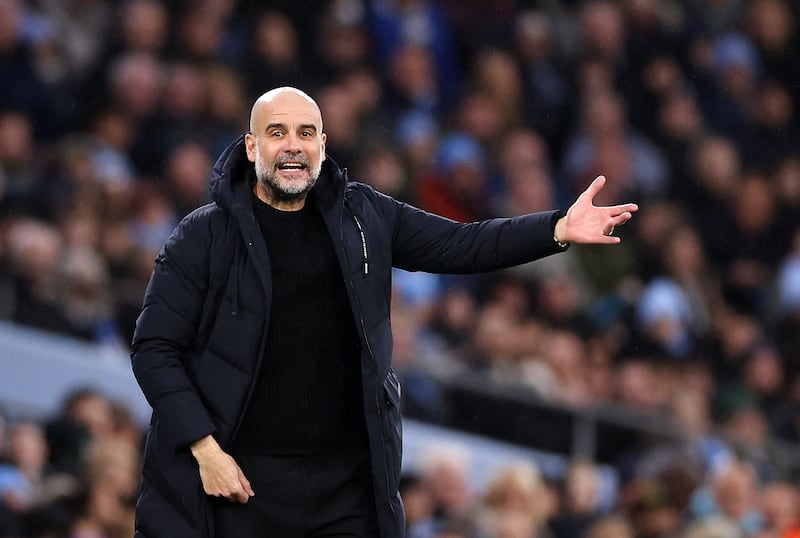 Manchester City head coach Pep Guardiola gestures on the touchline. EPA
