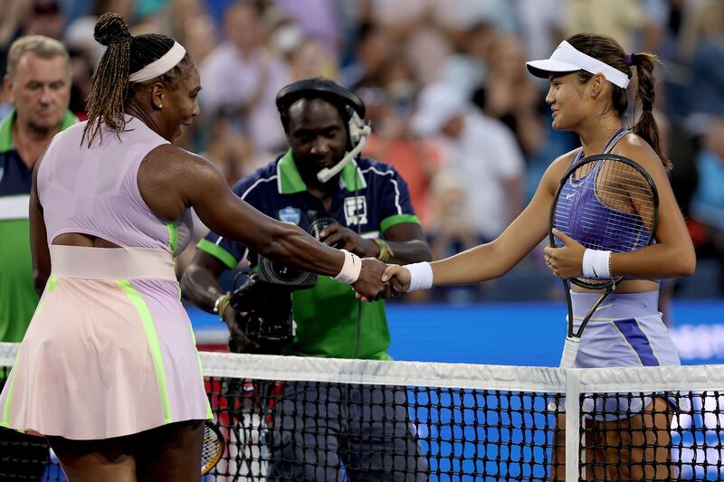 Serena Williams congratulates Emma Raducanu after their match during the Western & Southern Open at Lindner Family Tennis Center on August 16, 2022 in Mason, Ohio. AFP