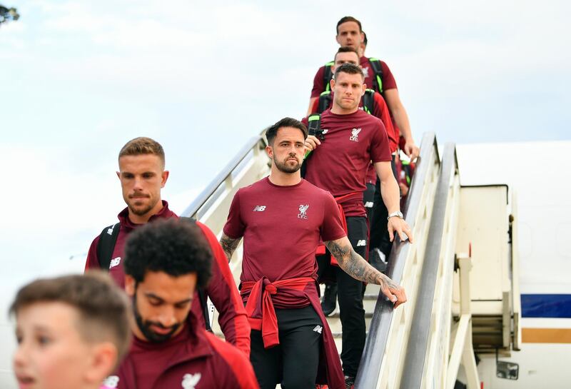 A handout photo made available by the UEFA of Liverpool players (L-R) Jordan Henderson, Danny Ings, and James Milner arriving ahead of the UEFA Champions League final at IEV Airport in Kiev, Ukraine.  EPA / UEFA / HANDOUT