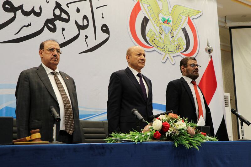 The head of Yemen's new presidential council Rashad al-Alimi stands during a session of the Yemeni parliament during which he and members of the presidential council took the oath in Aden. Reuters