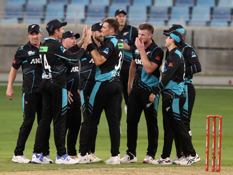 New Zealand bowler Tim Southee, centre, finished with 5-25.