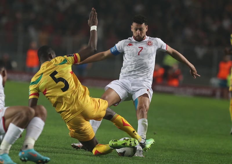 Tunisia's Youssef Msakni vies for the ball with Mali's Boubacar Kiki Kouyate during the World Cup qualifier. EPA