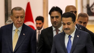 Iraq's Prime Minister Mohammed Shia al-Sudani and Turkey's President Recep Tayyip Erdogan arrive for the signing of the "Development Road" framework agreement on security, economy, and development in Baghdad, Iraq on April 22, 2024. Reuters