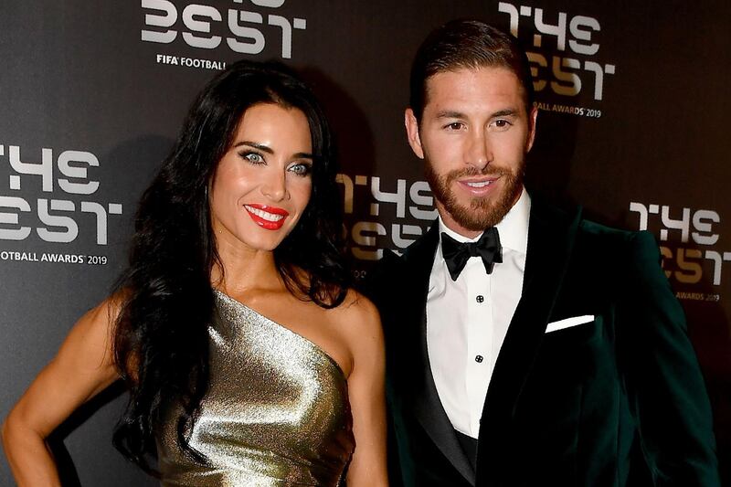 Real Madrid and Spain defender Sergio Ramos arrives with his partner Pilar Rubio. AFP