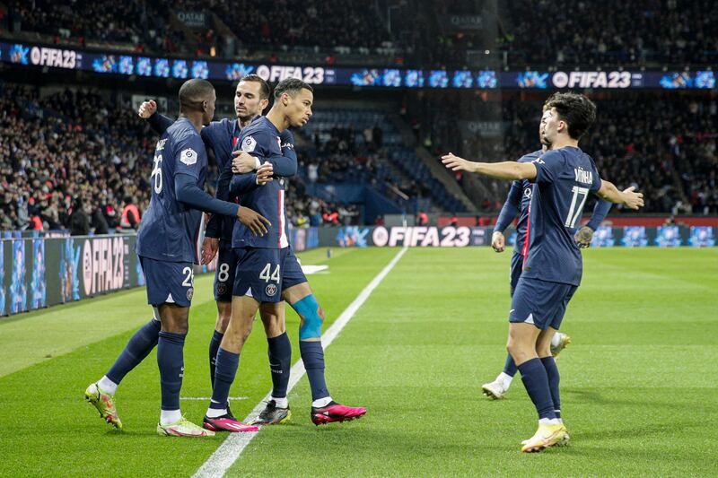 PSG's Hugo Ekitike celebrates with teammates after scoring the first goal. AFP