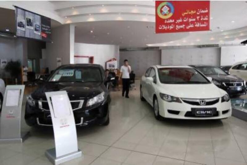 Emirati dealerships are placing substantial vehicle orders as they anticipate a surge in sales on the back of improving economic indicators. Amy Leang / The National