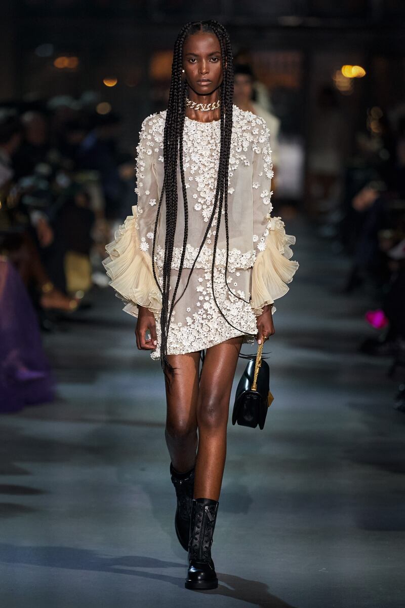 A look from the Valentino archive opened the show for the spring/summer 2022 collection